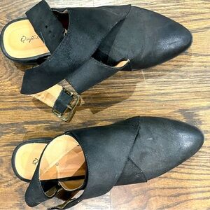 Sexy Qupid black shoes with straps.